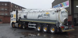 Liquid waste tanker and tractor unit fully repainted and lettered for a long time customer